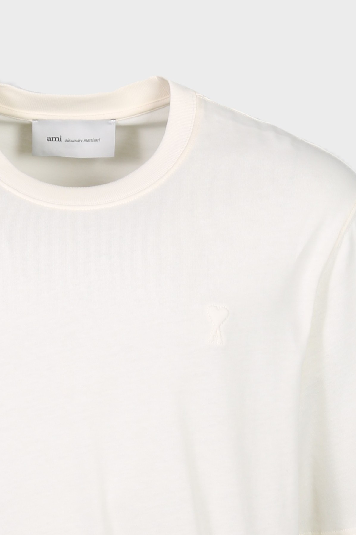 AMI PARIS de Coeur Embossed T-Shirt in White Cream