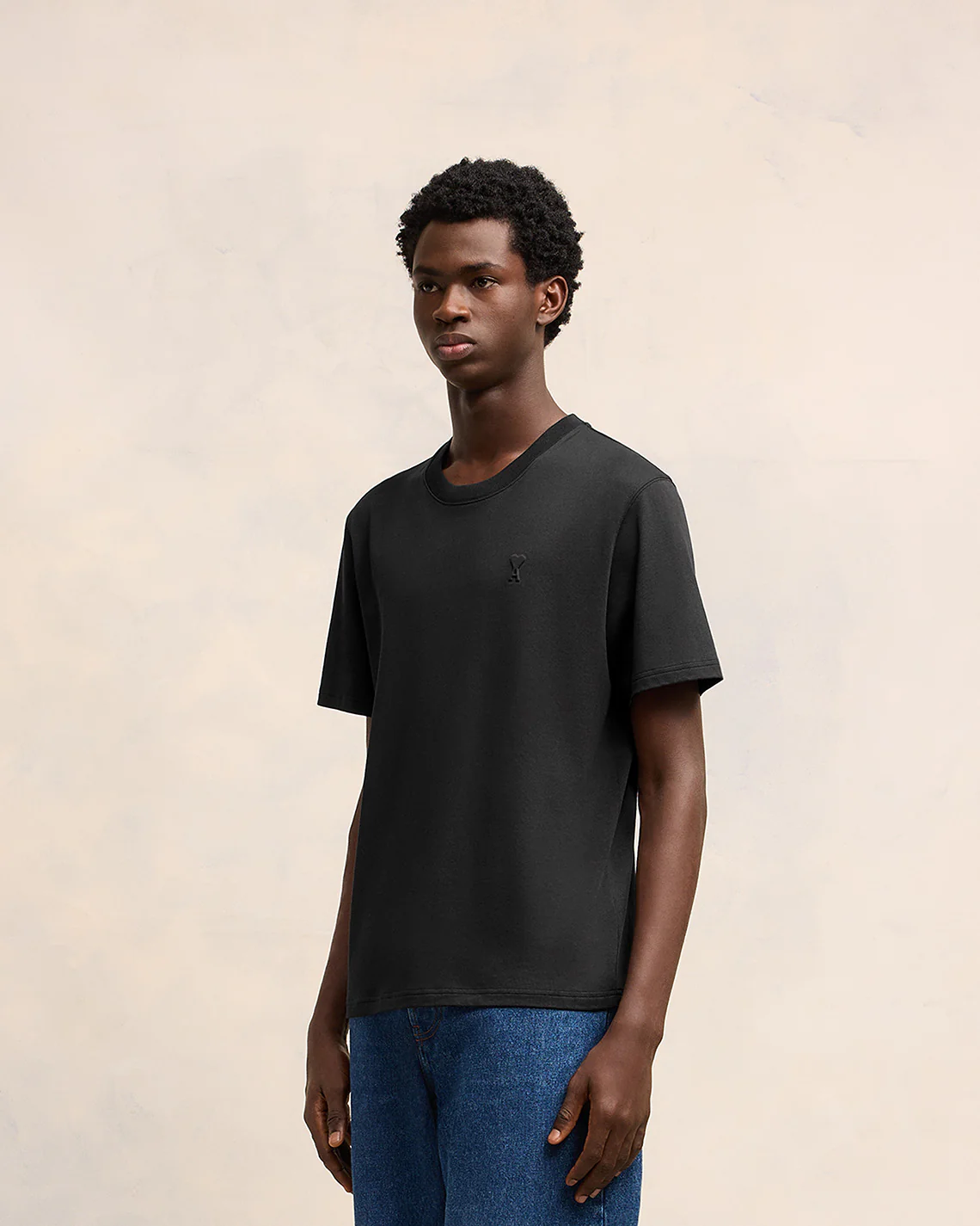 AMI PARIS de Coeur Embossed Classic Fit T-Shirt in Black AMI PARIS de Coeur Embossed Classic Fit T-Shirt in Black