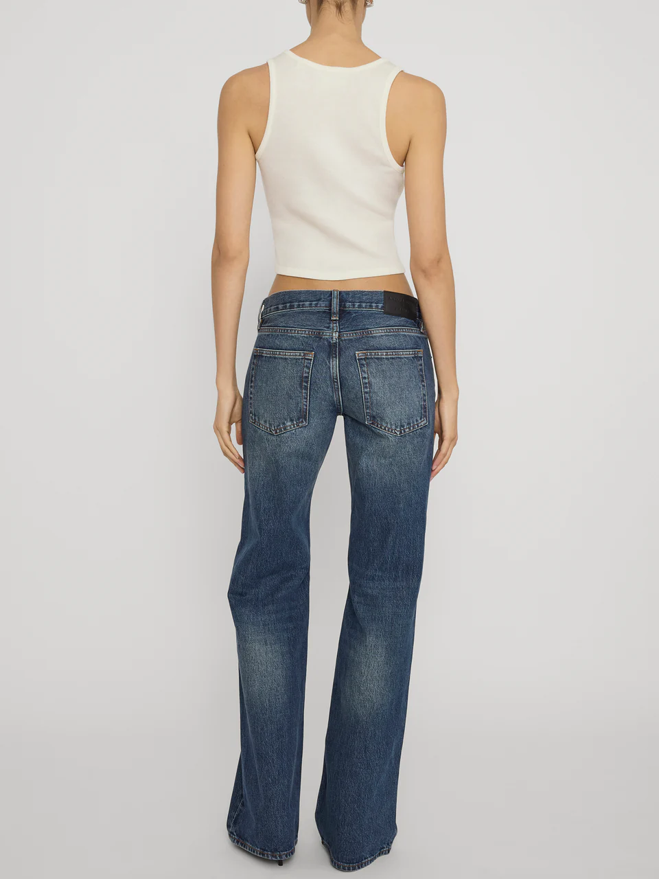 FRAME x AMELIA GRAY Jeans in Tolerate Wash