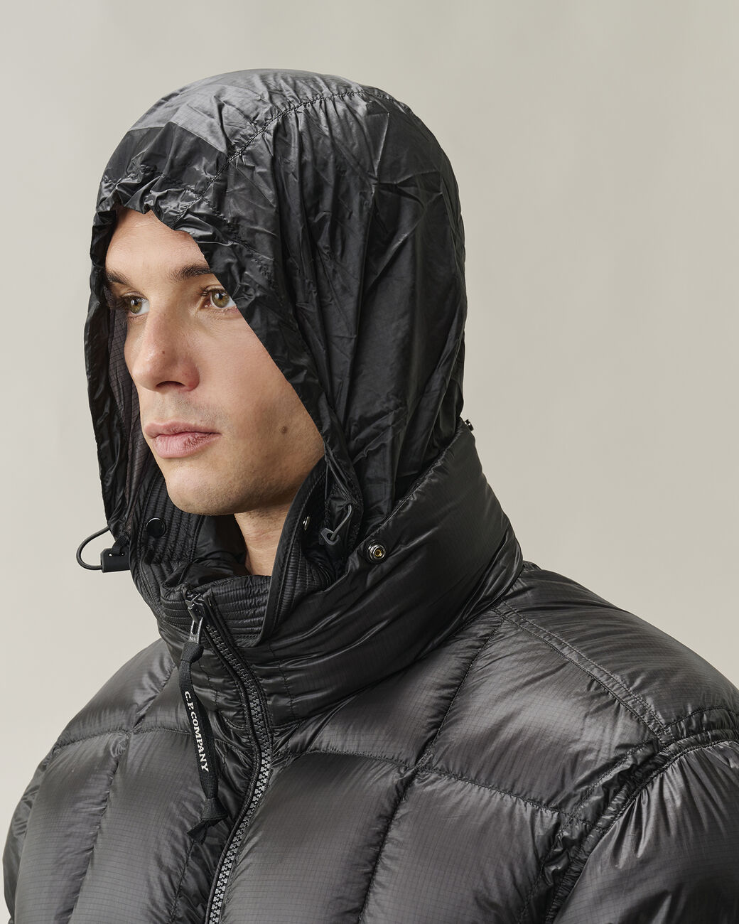 C.P. COMPANY D.D. Shell Lens Hooded Down Jacket in Black
