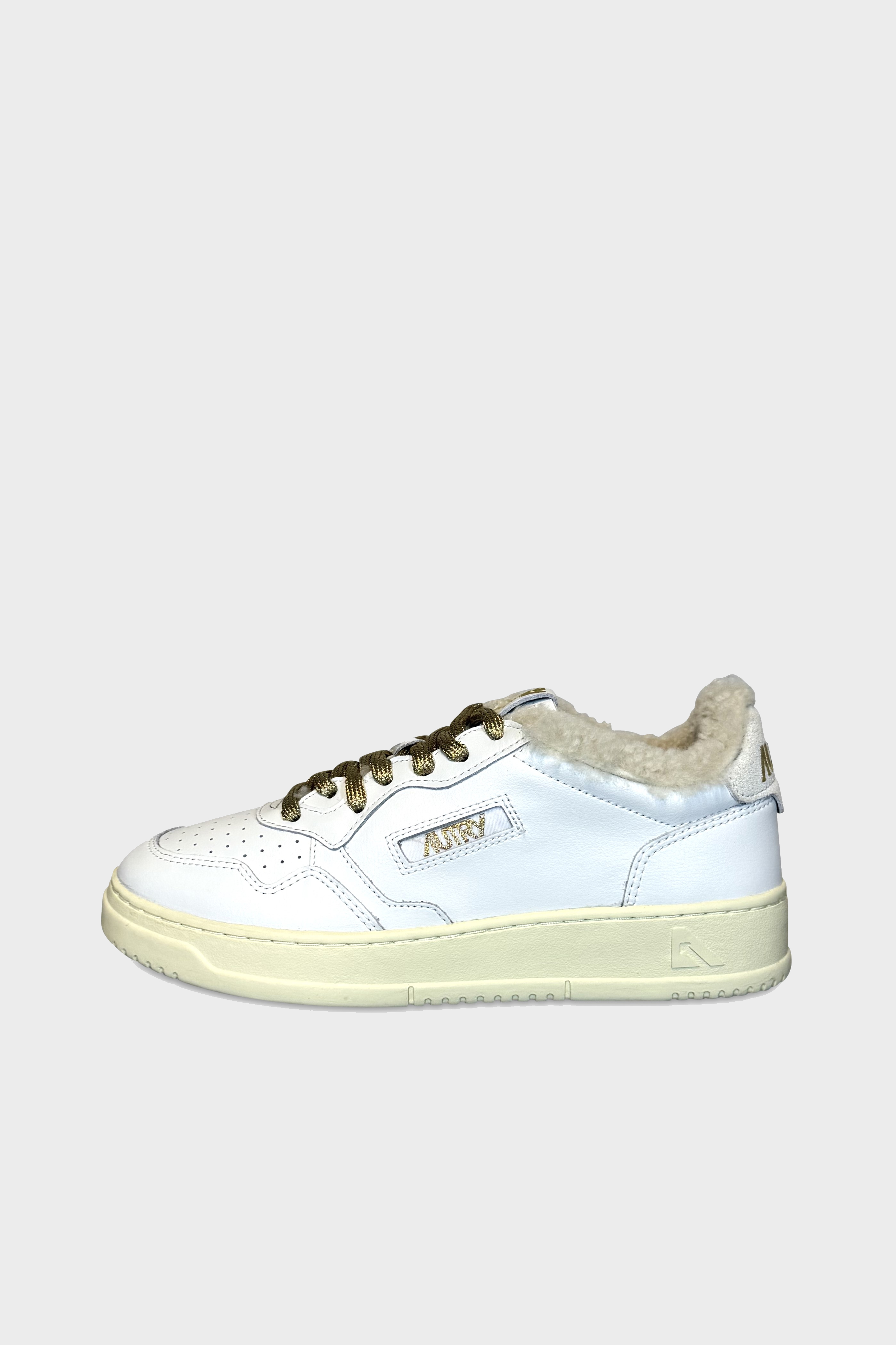 AUTRY ACTION SHOES Medalist Shearling Low Sneaker in White/Gold AUTRY ACTION SHOES Medalist Shearling Low Sneaker in White/Gold