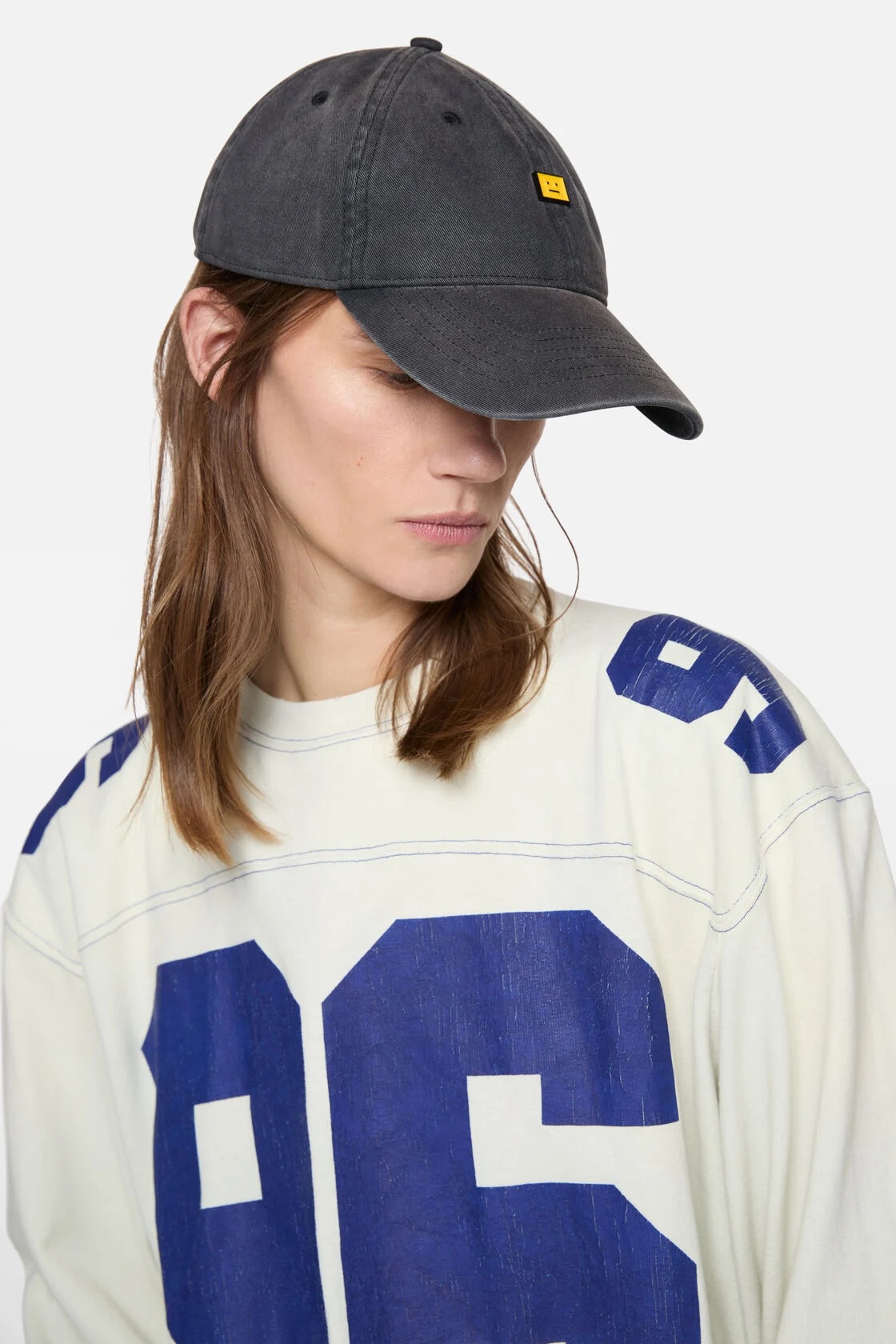 ACNE STUDIOS Face Cap in Washed Black/Yellow