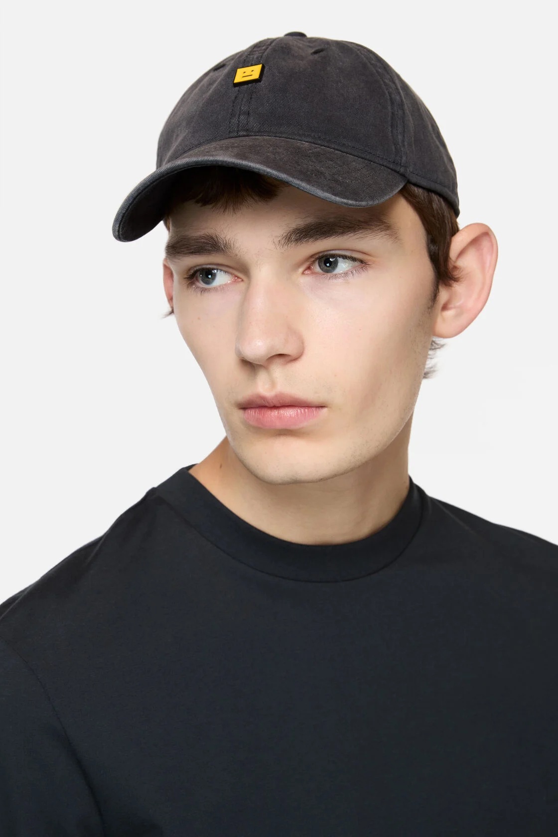 ACNE STUDIOS Face Cap in Washed Black/Yellow