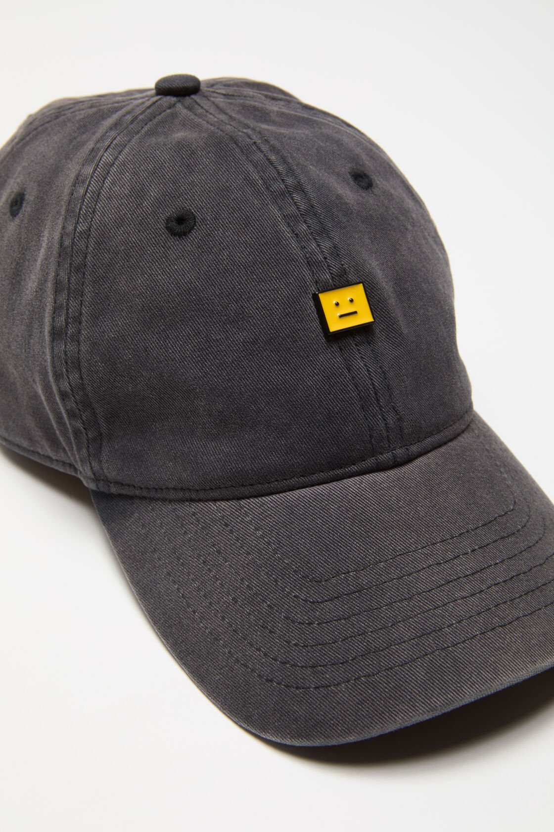 ACNE STUDIOS Face Cap in Washed Black/Yellow