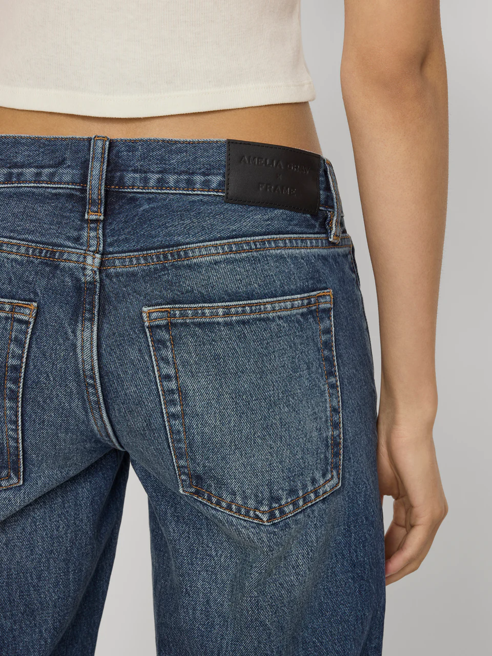 FRAME x AMELIA GRAY Jeans in Tolerate Wash