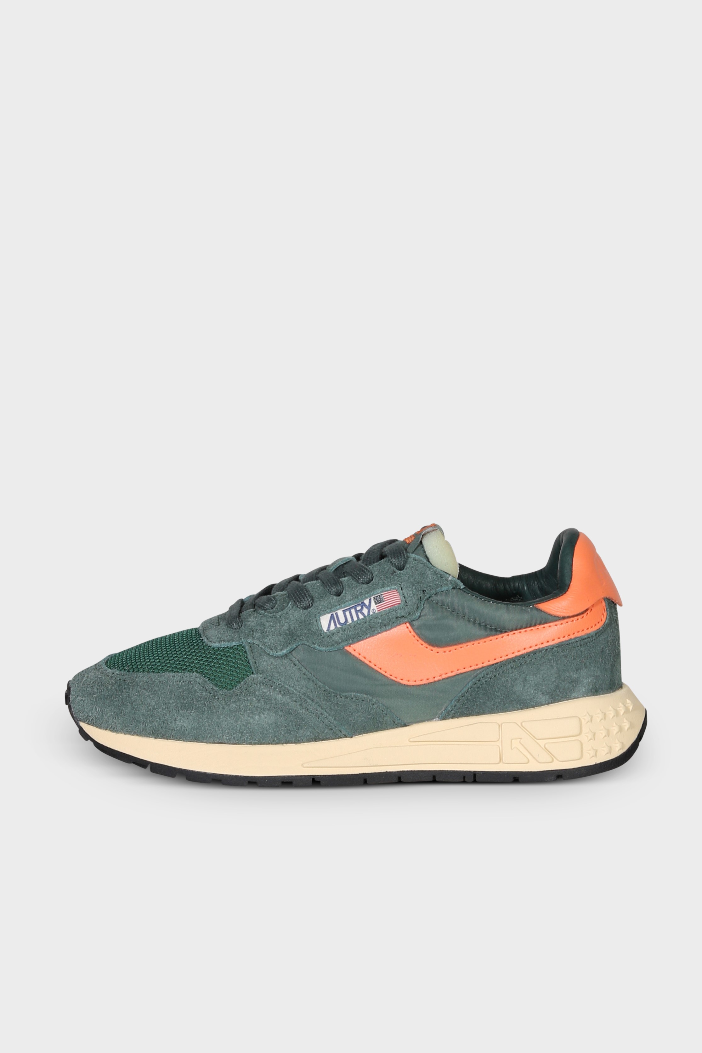 AUTRY ACTION SHOES Reelwind Low Sneaker in Bottle Green/Orange AUTRY ACTION SHOES Reelwind Low Sneaker in Bottle Green/Orange
