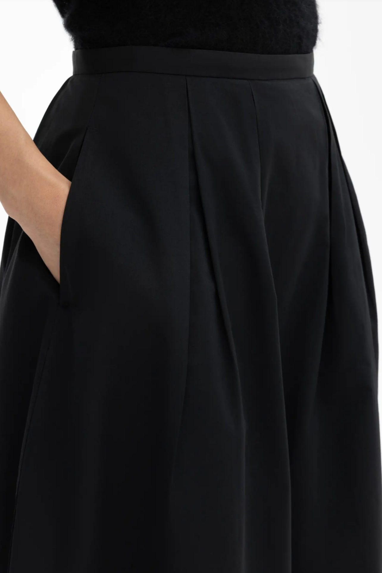DAGMAR Curved Pleated Skirt in Black