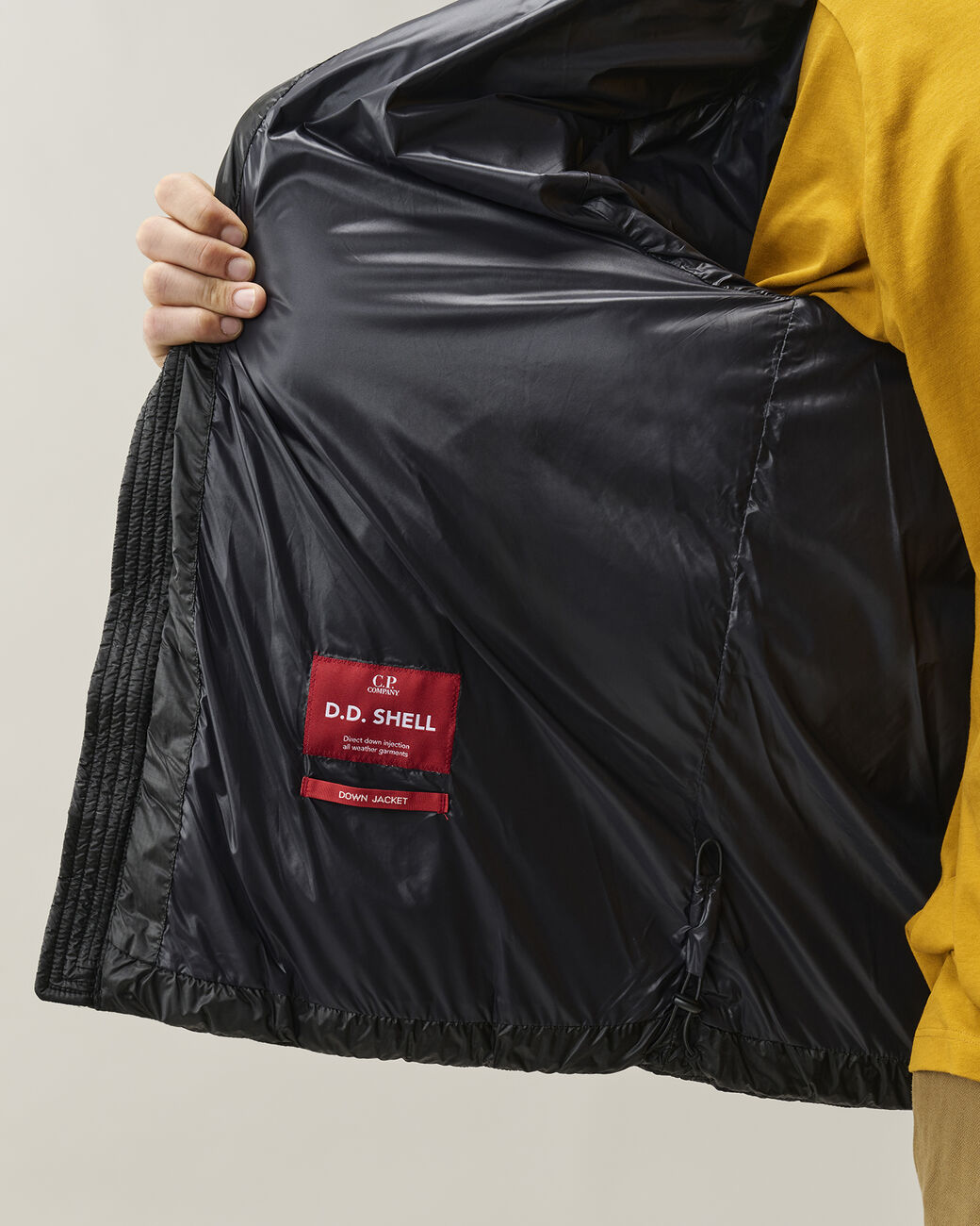 C.P. COMPANY D.D. Shell Lens Hooded Down Jacket in Black