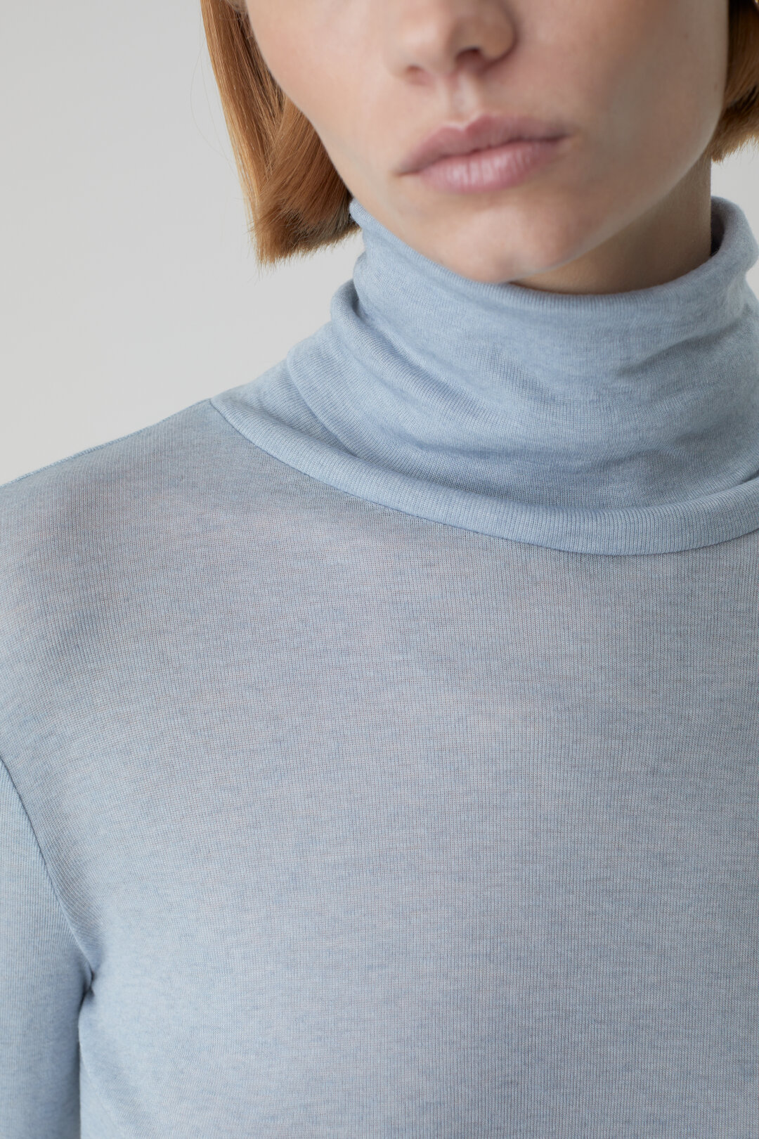 Closed Rollneck Knit Pullover in Light Blue Melange