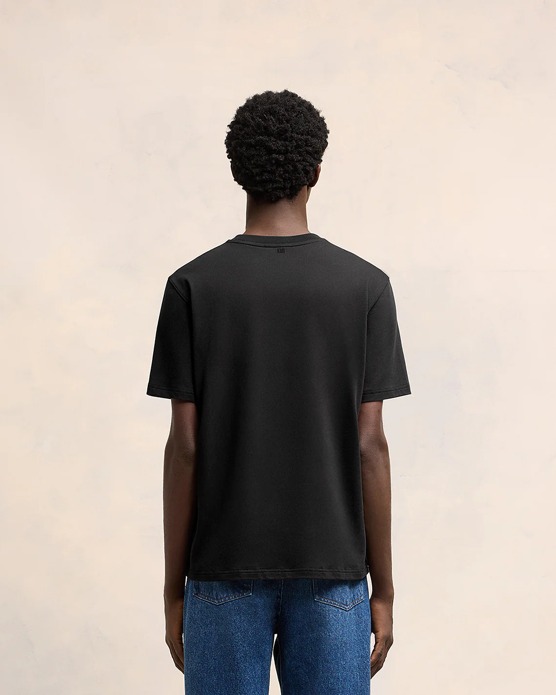 AMI PARIS de Coeur Embossed Classic Fit T-Shirt in Black AMI PARIS de Coeur Embossed Classic Fit T-Shirt in Black