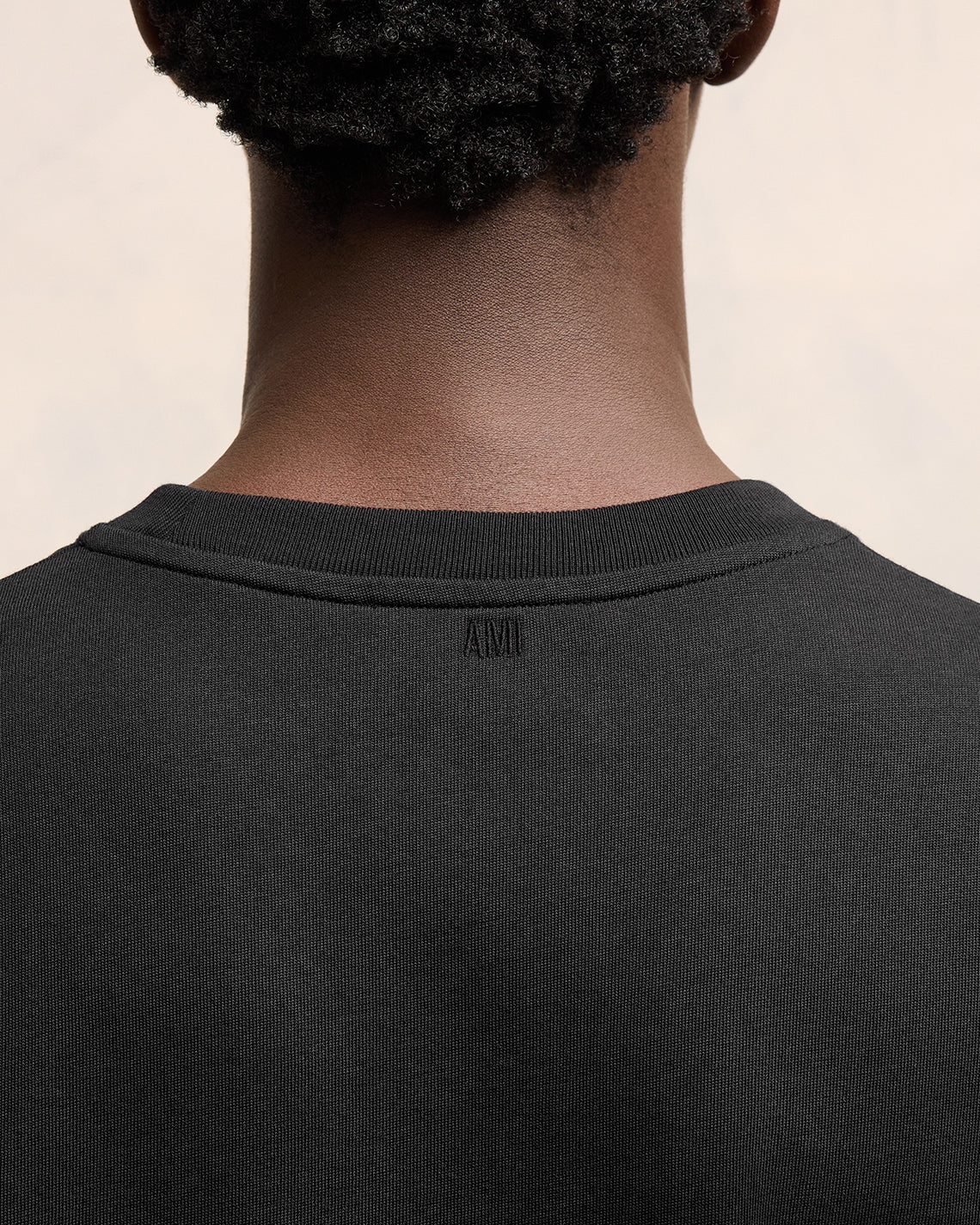 AMI PARIS de Coeur Embossed Classic Fit T-Shirt in Black AMI PARIS de Coeur Embossed Classic Fit T-Shirt in Black